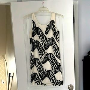 Maeve Zebra dress with black sequin detail. Size small. Knee length and swingy.